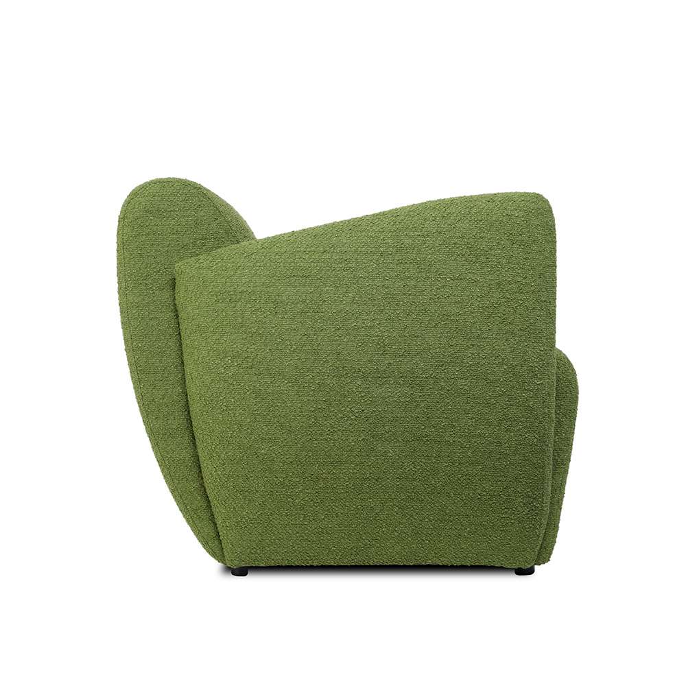 de zijkant van de groene lobby fauteuil